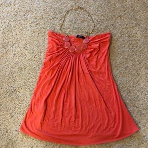 Cute shirt with gold necklace as a strap for neck